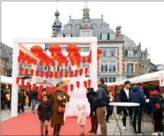  ?? PAN GEPING / XINHUA ?? People visit a fair celebratin­g Chinese New Year in Namur, Belgium, on Jan 28.