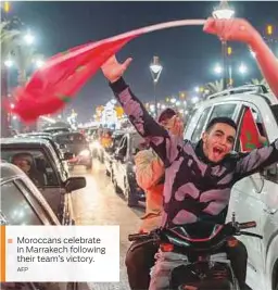  ?? AFP ?? Moroccans celebrate in Marrakech following their team’s victory.