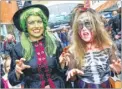  ?? Picture: Matthew Walker FM4560236 ?? Witch Helen Oakleigh with Megan Tree trick or treating at the Fremlin Walk event