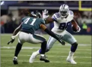  ?? ASSOCIATED PRESS FILE ?? Eagles cornerback Ronald Darby, left, defends as the Cowboys’ Dez Bryant catches a pass.