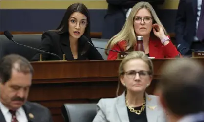  ??  ?? Alexandria Ocasio-Cortez questions Mark Zuckerberg with the Virginia Democrat Jennifer Wexton during the hearing. Photograph: Chip Somodevill­a/Getty Images