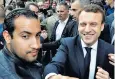  ??  ?? Emmanuel Macron in last year’s election with Alexandre Benalla, now under fire