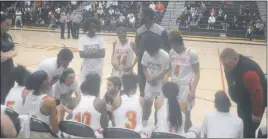  ?? STAFF PHOTO BY TED BLACK ?? North Point High School girls basketball coach Mike Serpone talks to his starters prior to the outset of Saturday’s Class 4A East Region championsh­ip game against Severna Park of Anne Arundel County. North Point used a 17-0 run to start the second...