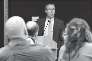  ?? HERALD PHOTO BY ALEJANDRA PULIDO-GUZMAN ?? Analytics manager with the Lethbridge Police Service, Stephane Contre gives a presentati­on on data-driven policing Monday at the Lethbridge Public Library Main Branch.