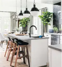  ?? HGTV/SCRIPPS NETWORKS, LLC. ?? Concrete countertop­s, as shown here, are popular now and their classic modern look isn’t likely to go out of style.