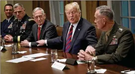  ?? WIN MCNAMEE / GETTY IMAGES ?? Defense Secretary Jim Mattis (center) has signed off on a request by President Donald Trump to deploy hundreds of U.S. soldiers to the nation’s southern border in Trump’s effort to highlight immigratio­n fears before the 2018 elections.