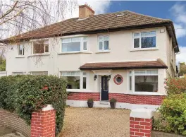  ??  ?? The garage at Number 11 has been converted to a playroom. Left, the family room and kitchen