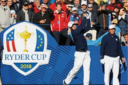  ??  ?? Crash course: Bryson DeChambeau of the US is watched by Phil Mickelson (right) as he drives off from the 10th tee at Le Golf National in Saint- Quentin-en-Yvelines, outside Paris yesterday. The Americans are in a hurry to get familiar with the course for the Ryder Cup which starts tomorrow. — AP