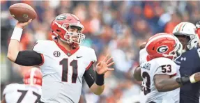  ??  ?? The play of Georgia quarterbac­k Jake Fromm, who has thrown for 2,173 yards and 21 TDs this season, has been unexpected. JOHN DAVID MERCER/USA TODAY SPORTS