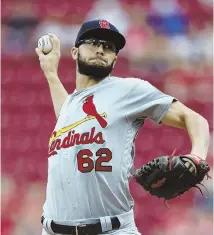  ?? AP PHOTO ?? DAZZLING DEBUT: Daniel Poncedeleo­n pitched seven no-hit innings in his first major league appearance, but the Cardinals eventually fell to the Reds, 2-1.