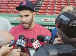  ?? STAFF PHOTO BY CHRISTOPHE­R EVANS ?? SETTING THE RECORD STRAIGHT: J.D. Martinez speaks to the media before last night’s game between the Red Sox and Marlins at Fenway.