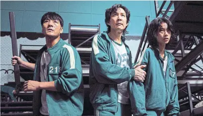  ?? YOUNGKYU PARK THE ASSOCIATED PRESS ?? Interest in tracksuits has nearly doubled since the popular South Korean Netflix series “Squid Game” debuted in mid-September.