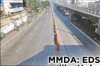  ?? MICHAEL VARCAS, EDD GUMBAN ?? The stretch of EDSA in Kamuning, Quezon City is practicall­y empty of motorists at around 8 a.m. yesterday. At left, militants march along España Boulevard to protest US President Donald Trump’s decision to pull out from the Paris climate accord. They...