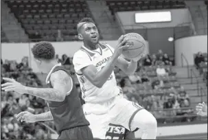  ?? Submitted photo ?? TROJAN BULLDOG: Louisiana Tech freshman Exavian Christon, of Hot Springs, drives to the hoop Thursday during a 78-76 home loss by the Bulldogs to UT-San Antonio. The Bulldogs dropped to 0-3 in Conference USA and play again today at 6 p.m. against UTEP....