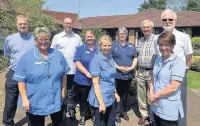  ??  ?? ●● The nursing team at East Cheshire Hospice with Christmas Tree Collection organisers. From left, Pete Chapman, Gill Tomlinson, Andrew Robertson, Charlotte Burgess, Clare Preston, Clare Watt, Richard Raymond, Tony Middleton and Sarah Hunter