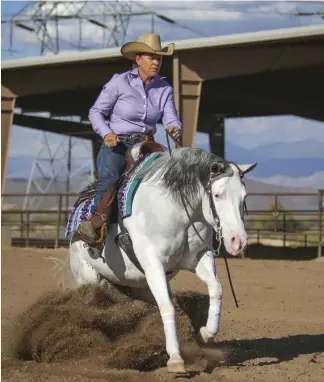  ??  ?? Crystal McNutt, a successful reining trainer of Arabians as well as Quarter Horses, says women today must prove they’re not a one-hit wonder and that they’re “going to stick around and be somebody.” But, she adds, “That’s just competitio­n, whether you’re a guy or a woman.”