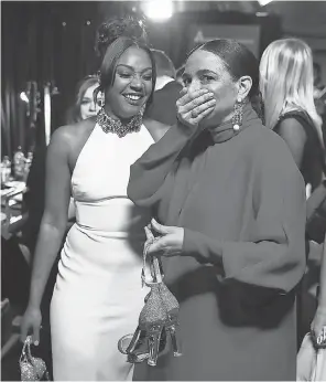  ??  ?? Tiffany Haddish and Maya Rudolph cracked each other up before they kicked off their slipper-clad funny business for the audience. MATT SAYLES/A.M.P.A.S.
