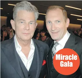  ??  ?? Music producer David Foster and foundation CEO Mike Ravenhill thanked gala attendees and concertgoe­rs for helping to raise a record-breaking $10.2 million to help Canadian families.