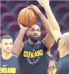  ?? JOSHUA GUNTER/ASSOCIATED PRESS ?? Cleveland’s Tristan Thompson works on his shot during the Cavaliers’ practice at Quicken Loans Arena on Tuesday. The Cavaliers, down 2-0 to the Golden State Warriors in the NBA Finals.