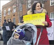  ?? MARIA DANILOVA / ASSOCIATED PRESS ?? Jennifer Ibrahim participat­es in a demonstrat­ion Friday outside Jefferson Middle School in Washington, D.C., where Secretary of Education Betsy DeVos paid her first visit in the post.