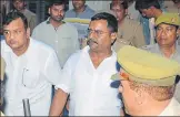  ?? SUDHIR SRIVASTAVA/HINDUSTAN ?? ▪ Atul Singh Sengar (centre) in police custody, in Unnao on Tuesday.