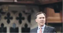  ??  ?? Minister of Finance Bill Morneau responds during question period in the House of Commons on Tuesday.