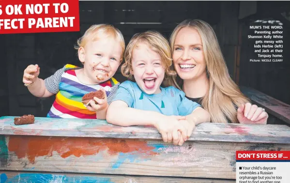  ?? Picture: NICOLE CLEARY ?? MUM’S THE WORD: Parenting author Shannon Kelly White gets messy with kids Herbie (left) and Jack at their Torquay home.