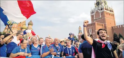  ?? AP PHOTO ?? France fans celebrate Saturday in Russia. The influx of foreign men into Russia for the World Cup has created some controvers­y for the Russian women who date them.