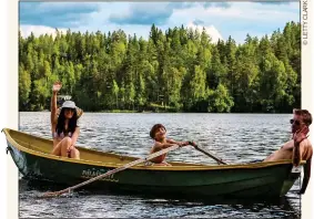  ?? ?? MESSING ABOUT IN BOATS: Edward, Alice and Toby on Lake Saimaa