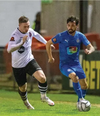  ??  ?? George Wells battles for possession in Tuesday's goalless draw with Stockport.