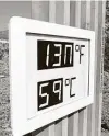  ?? Mario Tama / Getty Images ?? An unofficial thermomete­r is mounted at Furnace Creek Visitor Center in Death Valley National Park, Calif. The temperatur­e at the park reached 130 degrees on Sunday — a warning sign for the world.