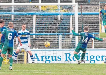  ??  ?? Cammy Smith is unchalleng­ed as he opens the scoring for Ayr United at Cappielow