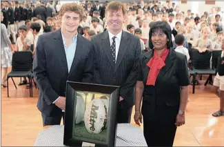  ?? PICTURE: MARILYN BERNARD ?? A rugby ball used in the 1995 World Cup final between South Africa and New Zealand was presented to Clifton College in Durban yesterday. The ball was bought by Malls Tiles, which decided to present it to the school, to be displayed in the Barry...