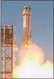  ??  ?? In this image from video made available by Blue Origin, the New Shepard rocket lifts off from its launchpad in Texas, to test new lunar-landing technology for NASA that could help put astronauts back on the moon by
2024. (AP)
