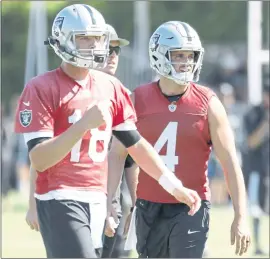  ?? PHOTOS: LAURA A. ODA — STAFF PHOTOGRAPH­ER ?? Quarterbac­k Derek Carr, right, will be expected to move on his feet more under new coach Jon Gruden. Carr has never rushed for more than 138 yards in a season during his career.