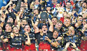  ??  ?? Euro vision: Saracens celebrate winning the Champions Cup last year, and (below left), how Gavin Mairs led the way with the story in his The Talk of Rugby column