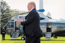  ?? ALEX WONG GETTY IMAGES ?? U.S. President Donald Trump walks toward Marine One as he departs the White House for a town hall event in Florida.