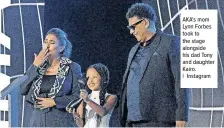  ?? ?? AKA’s mom Lynn Forbes took to the stage alongside his dad Tony and daughter Kairo. | Instagram
The musician scooped four awards, kicking off the night with
the
Best
