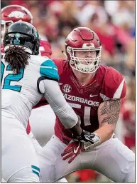  ?? NWA Democrat-Gazette/BEN GOFF ?? Left guard Hjalte Froholdt is among players maintainin­g firstteam status this spring for the Razorbacks amid competitio­n for other positions.