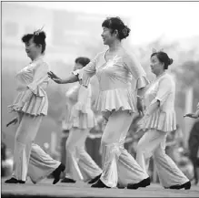  ?? ZHANG YANLIN / FOR CHINA DAILY ?? Women, mostly retirees, stay fit by dancing at an open space in Bozhou, Anhui province.