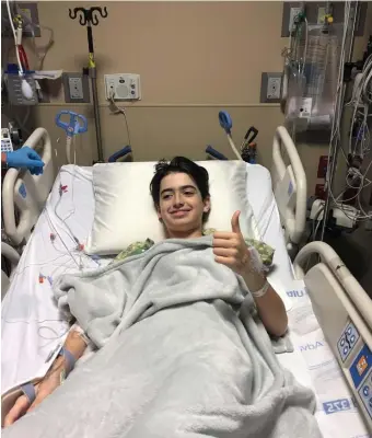  ?? COurtesy mICheLLe LOpeZ, abOVe; ap FILe, beLOW ?? CLOSE CALL: Even though 15-year-old Lucas Cruz, of Florida, lost 70% of his blood when a bull shark lacerated his legs while lobster diving, the survivor said the situation has made him stronger and won’t keep him from the ocean.