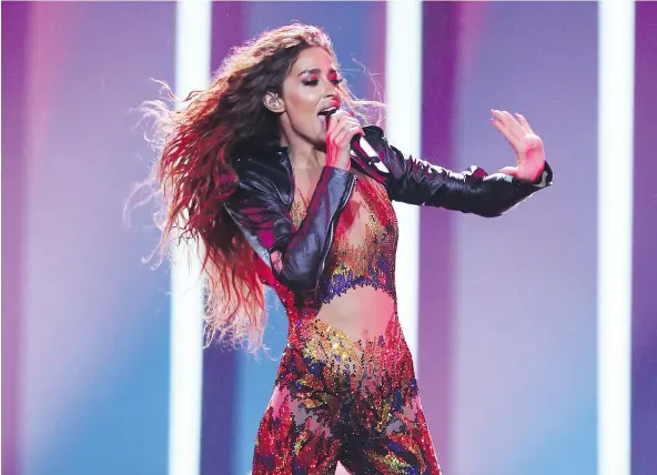  ?? — PHOTOS: THE ASSOCIATED PRESS ?? Eleni Foureira is on fire — her song Fuego could bring Cyprus its first triumph at the Eurovision Song Contest.