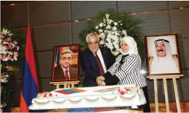  ??  ?? KUWAIT: Social Affairs Minister Hind Al-Subaih (right) and Armenian Ambassador Manvel Badeyan cut the cake during a ceremony held to celebrate the Armenian National Day.
— Photo by Joseph Shagra