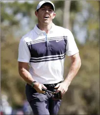  ?? ASSOCIATED PRESS FILE PHOTO ?? Rory McIlroy delivered the winning shot as he and Dustin Johnson beat Rickie Fowler and Matthew Wolff in a skins competitio­n for charity Sunday at Seminole Golf Club in Juno Beach, Florida.