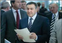  ?? The Associated Press ?? ARAS AGALAROV: In this Aug. 30, 2012, file photo, Russian businessma­n Aras Agalarov, center, is seen in Moscow. They may have been the hidden link between Donald Trump’s campaign and Russia’s government: A Moscow-based billionair­e and his pop star son,...