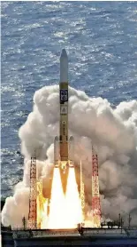  ?? Yomiuri Shimbun file photo ?? Japan’s H2A rocket carrying a lunar probe lifts off from the Tanegashim­a Space Center in Kagoshima Prefecture in September 2023.