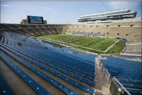  ?? MICHAEL CATERINA - THE ASSOCIATED PRESS ?? Notre Dame players warm up during NCAA college football practice Thursday, Aug. 19, 2021 at Notre Dame Stadium in South Bend, Ind.