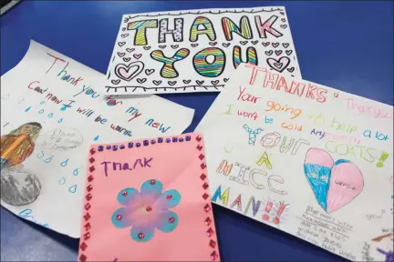  ?? Cassandra Day / Hearst Connecticu­t Media ?? Bielefield Elementary School students made thank-you cards for the anonymous donor who contribute­d coats for students.