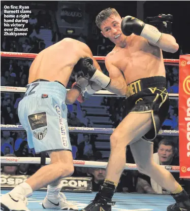  ??  ?? On fire: Ryan Burnett slams home a right hand during his victory over Zhanat Zhakiyanov