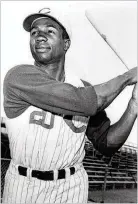  ?? CONTRIBUTE­D ?? Frank Robinson signed with the Reds in 1953 and made his major league debut as Cincinnati’s left fielder three years later. He hit 38 home runs that season.